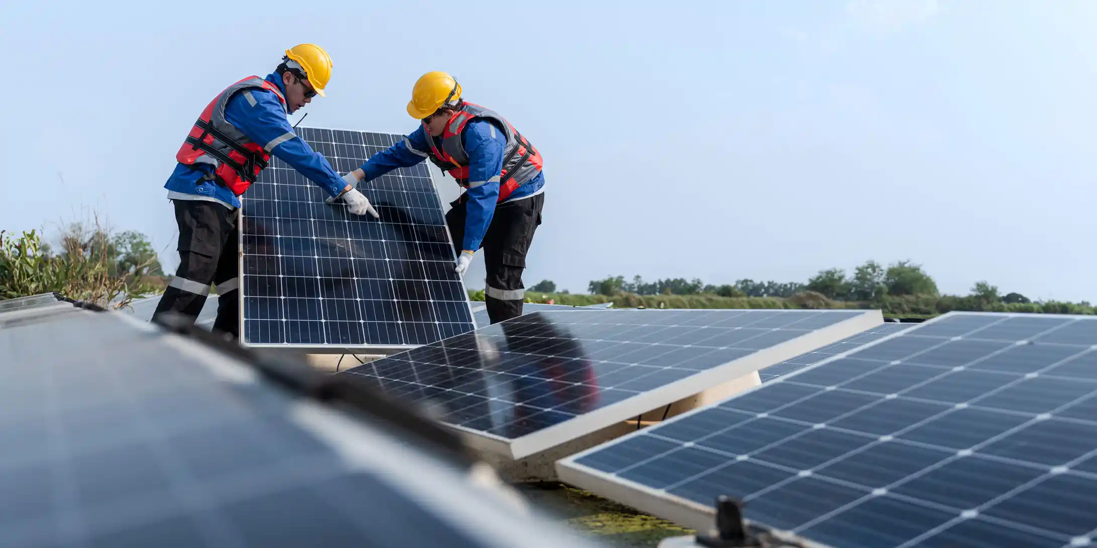 Men installing Solar panels