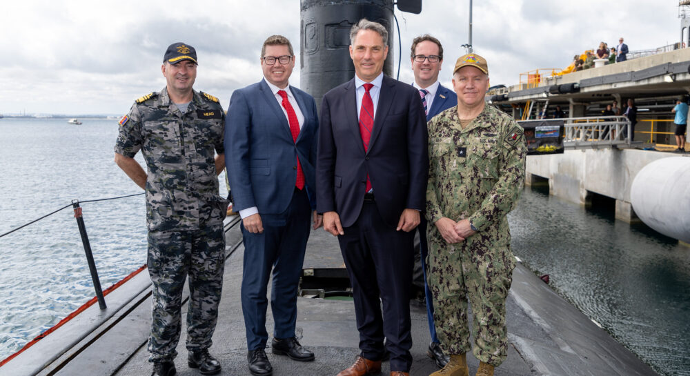 Defence Minister Richard Marles (centre) and Defence Industry Minister Pat Conroy (second left) on USS Asheville at HMAS Stirling in WA. Photo US Indo-Pacific Command/Flickr