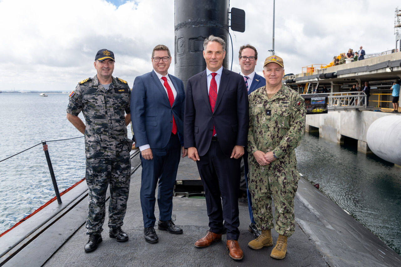 Defence Minister Richard Marles (centre) and Defence Industry Minister Pat Conroy (second left) on USS Asheville at HMAS Stirling in WA. Photo US Indo-Pacific Command/Flickr