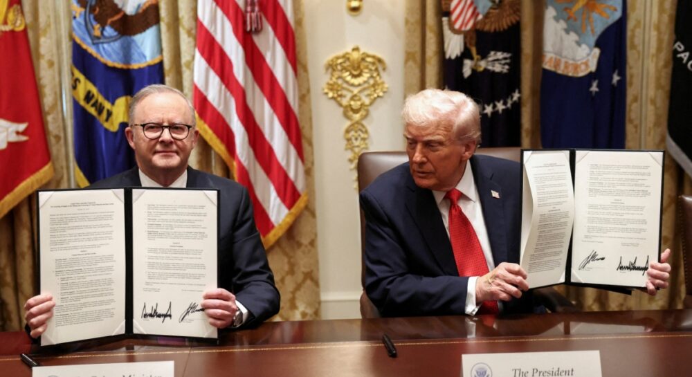 PM Anthony Albanese and President Donald Trump sign the critical minerals and rare-earths deal in Washington in October 2025.