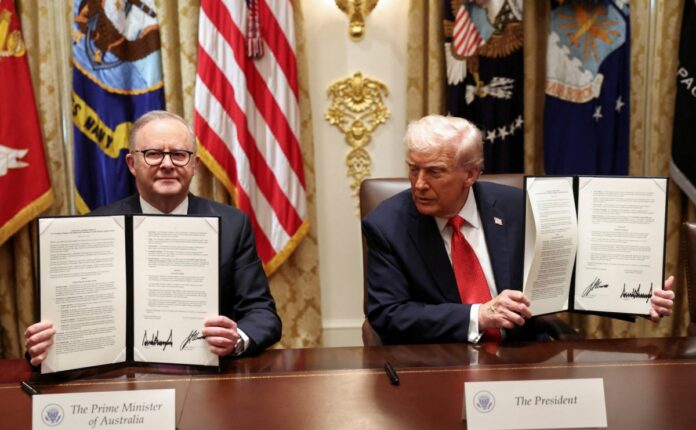 PM Anthony Albanese and President Donald Trump sign the critical minerals and rare-earths deal in Washington in October 2025.