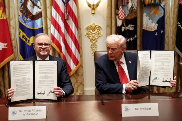 PM Anthony Albanese and President Donald Trump sign the critical minerals and rare-earths deal in Washington in October 2025.