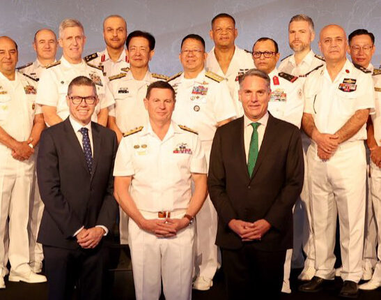 Marles and Conroy at the arms expo