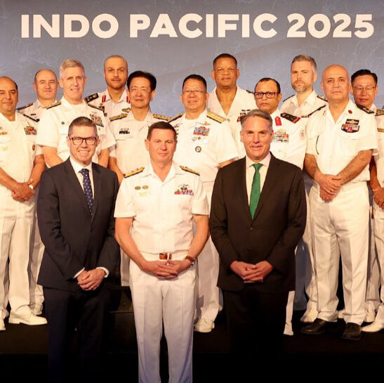 Marles and Conroy at the arms expo