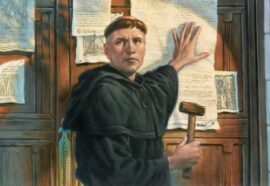Martin Luther nails 95 theses to a church door in Wittenberg in 1517.